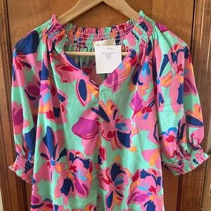 Cute new spring top. Size M. NWT.